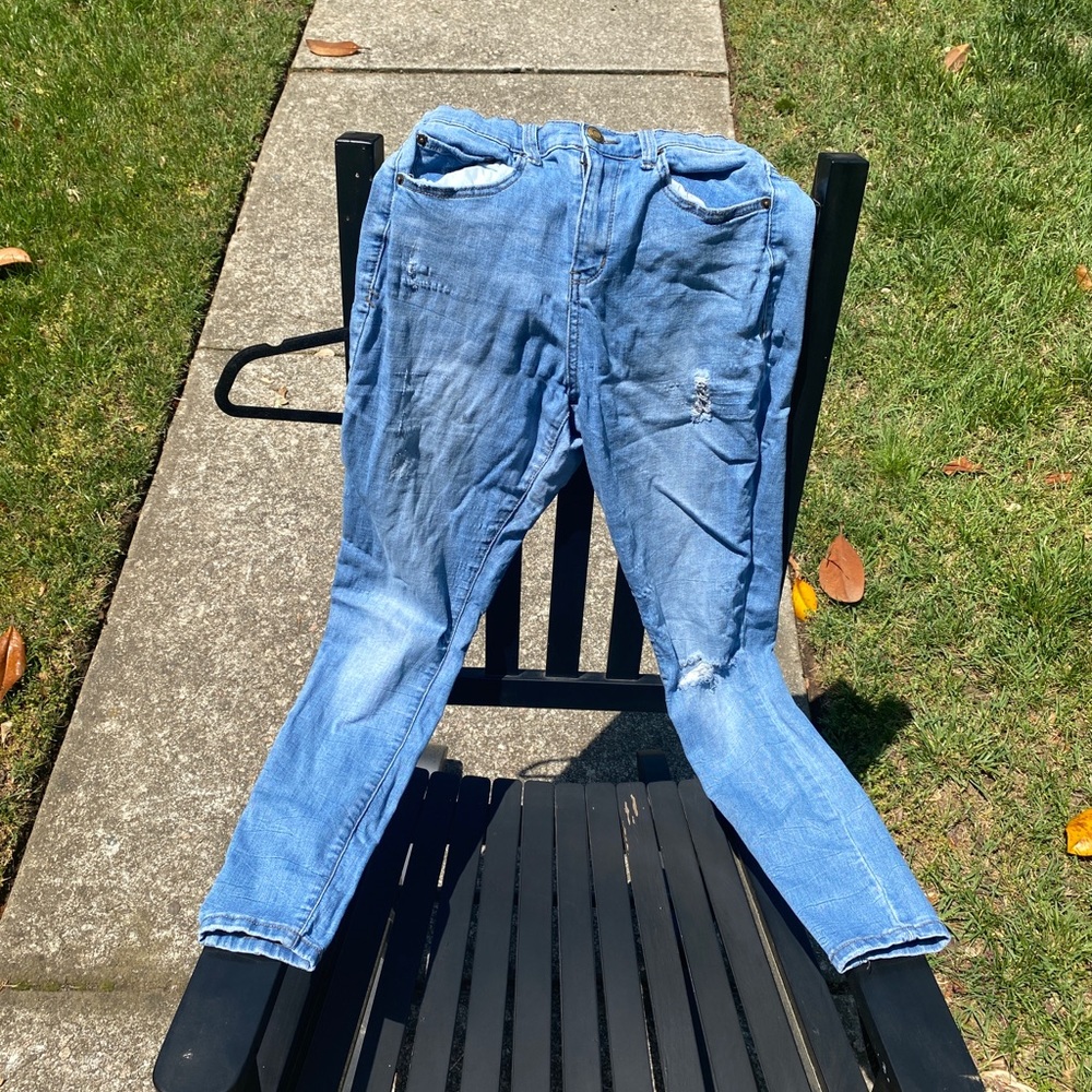 Light wash stretchy distressed jeans